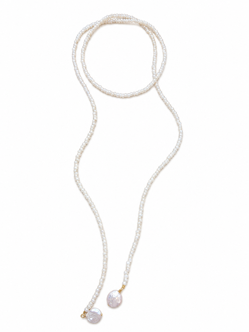 A long white pearl necklace with two large, irregular baroque pearl drops at the ends, each accented with a small gold bead, displayed on a clean white background.