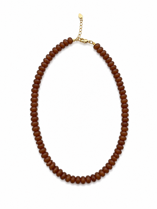 Brown beaded necklace on a white background