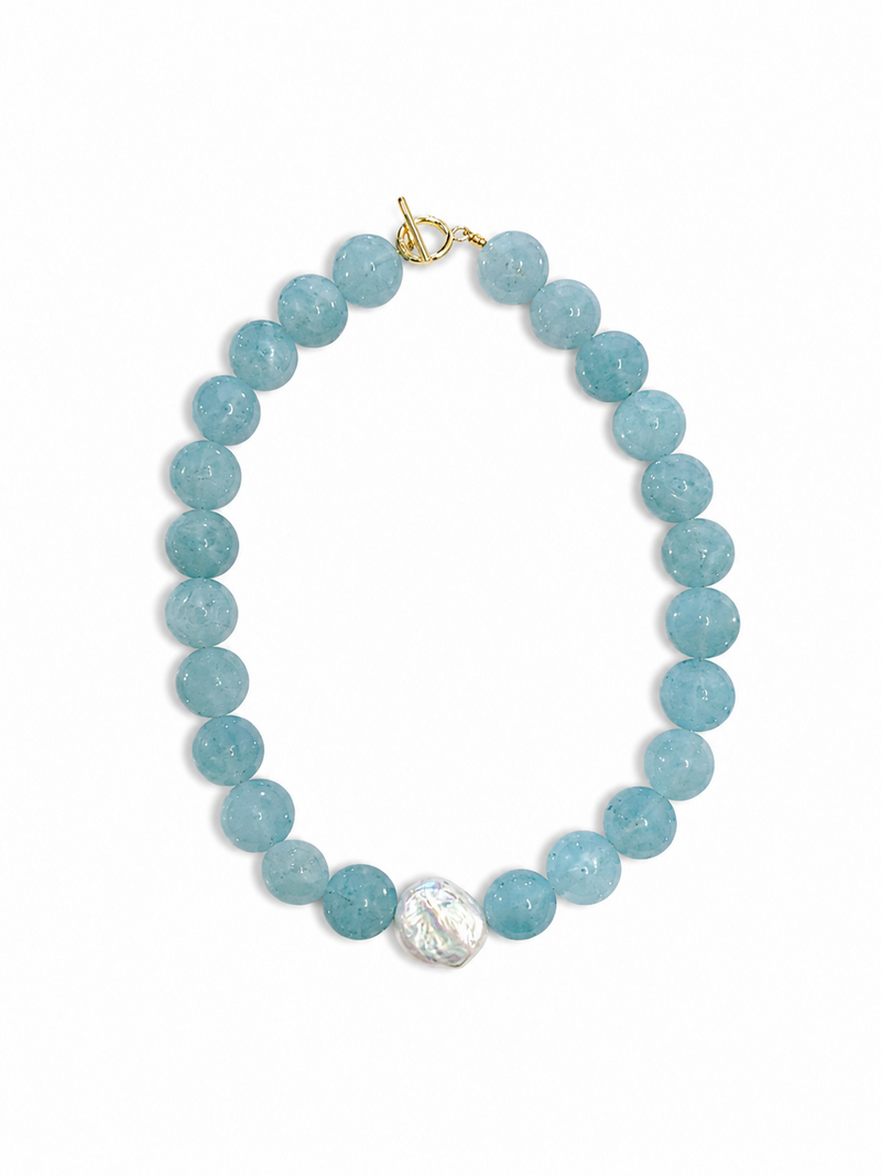 Blue beaded bracelet with a gold clasp on a white background – handmade beaded jewelry by EmJ Jewels
