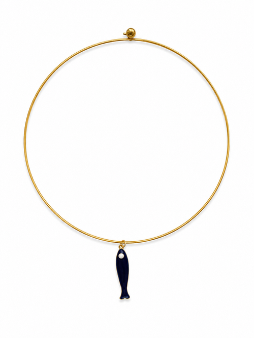 Gold necklace with a black fish pendant on a white background