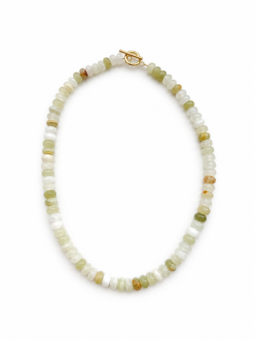 Necklace with small beads on a white background