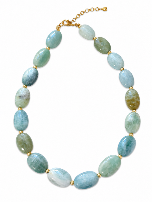 A beaded necklace made of polished light blue and green stone beads separated by small gold spacers, with a gold clasp and extender chain, shown on a plain white background.