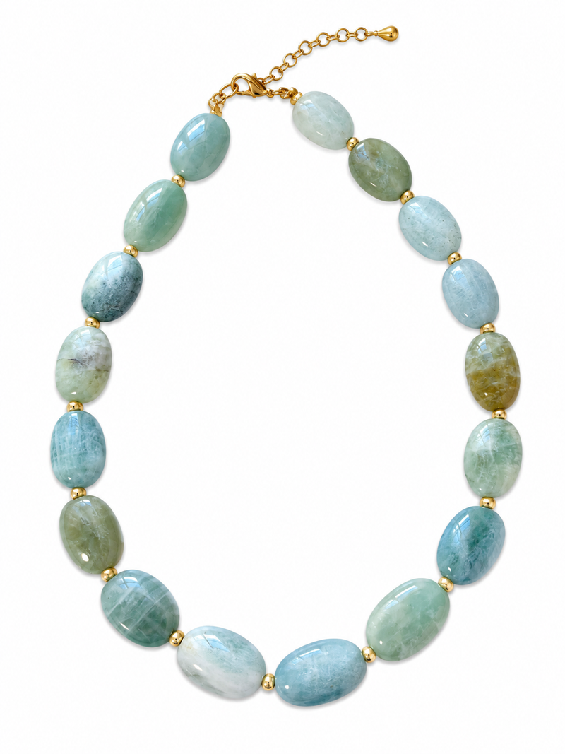 A beaded necklace made of polished light blue and green stone beads separated by small gold spacers, with a gold clasp and extender chain, shown on a plain white background. – handmade beaded jewelry by EmJ Jewels